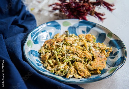 Fried Eggs with Toona Sprouts