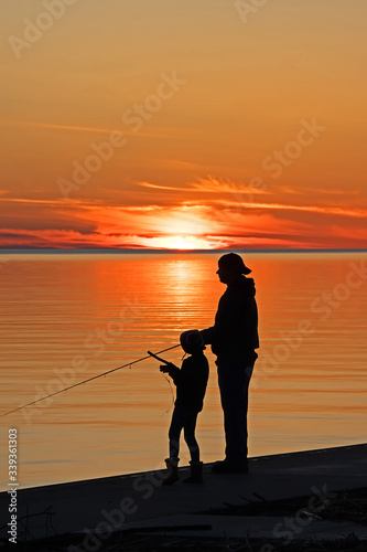 fishing at sunset