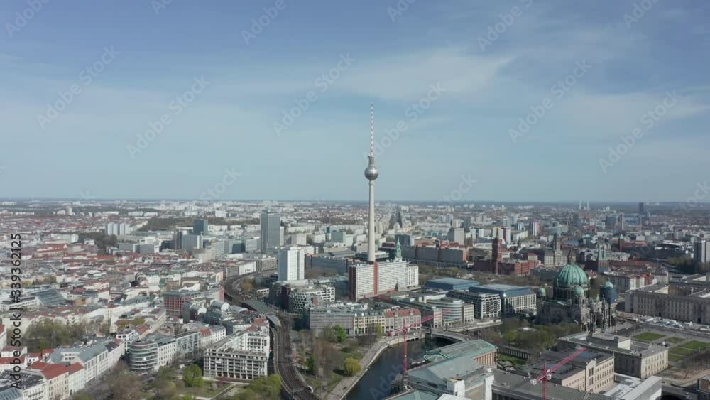 AERIAL: Wide View of Empty Berlin, Germany Alexanderplatz TV Tower with almost No People or Cars on Beautiful Sunny Day During COVID19 Corona Virus Pandemic AERIAL: Wide View of Empty Berlin, Germany Alexanderplatz TV Tower with almost No People or Cars on Beautiful Sunny Day During COVID19 Corona Virus Pandemic