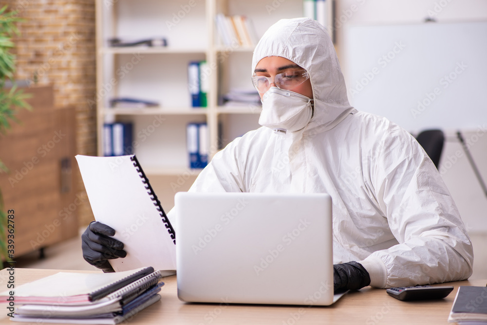 Office worker working in quarantine self-isolation Office worker working in quarantine self-isolation