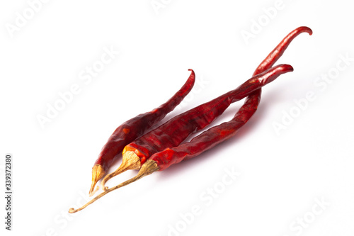 De Arbol Chilli cayenne dry Mexico hot pepper pod in white photo