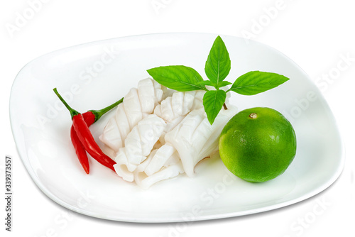 Boiled squid with chili and lemon and basil isolated on white background