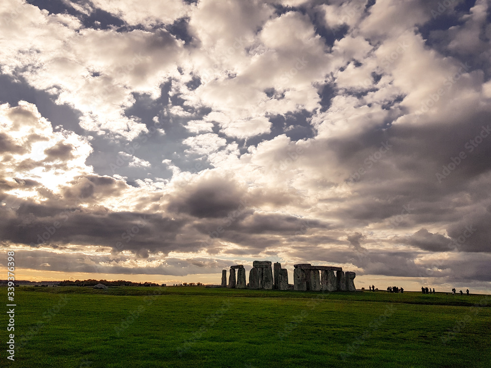 Stonehenge an ancient prehistoric stone monument near Salisbury with dramatic sky, Wiltshire, UK. in England