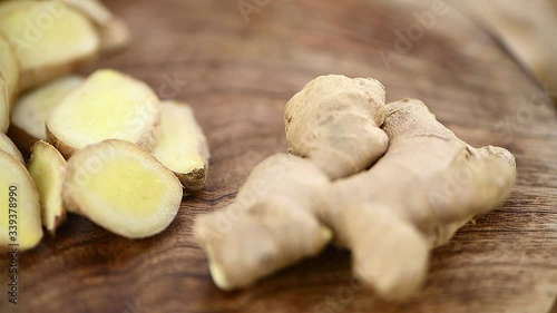 Portion of Ginger on a rotating wooden plate (close-up and seamless loopable)