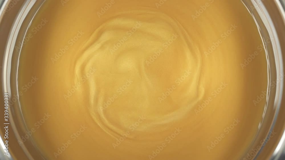 Rheoscopic fluid. Beautiful movement of particles in a liquid. Fantastic patterns and shapes. Rheoscopic fluid. Beautiful movement of particles in a liquid. Fantastic patterns and shapes.