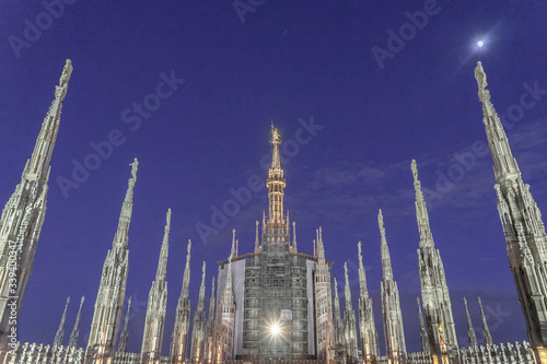 The view of Duomo di Milano from balcony in night time.