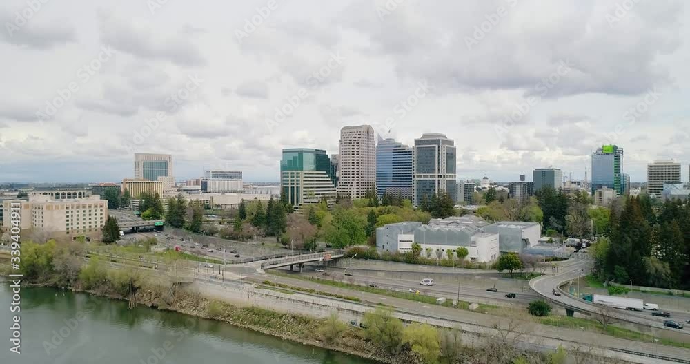 Close Low Altitude Rising Aerial Forward Dolly Approaching Downtown Sacramento Close Low Altitude Rising Aerial Forward Dolly Approaching Downtown Sacramento