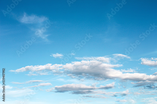 White clouds patterns on bright blue sky , copy space