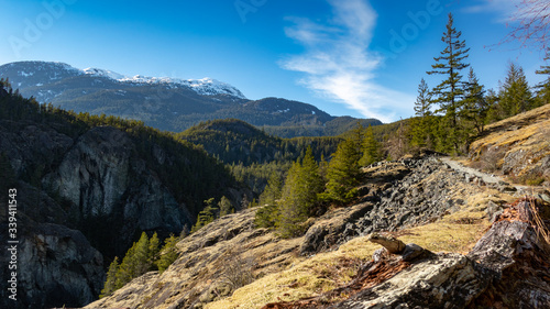 Trail with the view on the mountains. British Columbia, Canada.