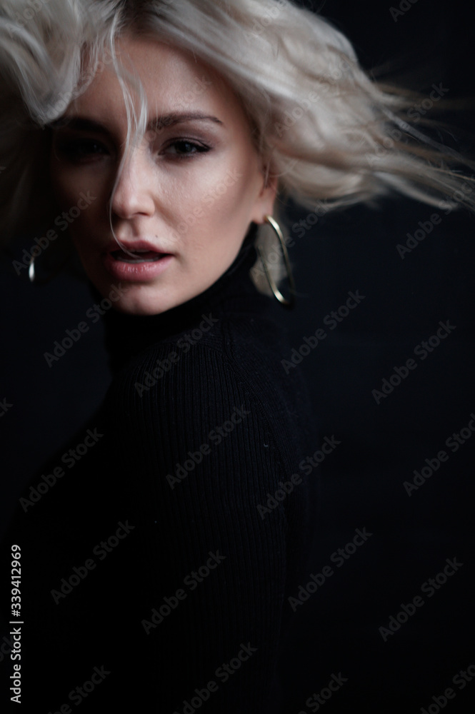 Fashion portrait of beautiful, sexy girl in loft dark interior Fashion portrait of beautiful, sexy girl in loft dark interior