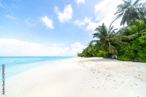 The amazing long white sand beach of Dhigurah, Maldives photo