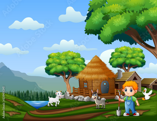 Young farmer with animals at the farmland