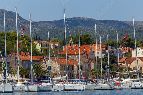 STARI GRAD / CROATIA - AUGUST 2015: View to the colourful houses in the old bay of Stari Grad town on Hvar town, Croatia photo