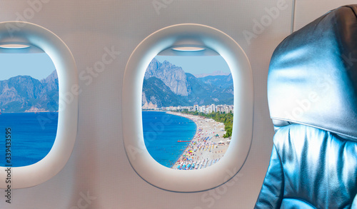 Fototapeta Naklejka Na Ścianę i Meble -  Konyaalti beach as seen through window of an aircraft  - Antalya, Turkey