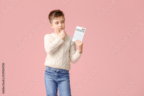 Thoughtful little boy with ...