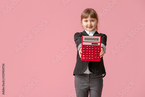 Little girl with calculator...