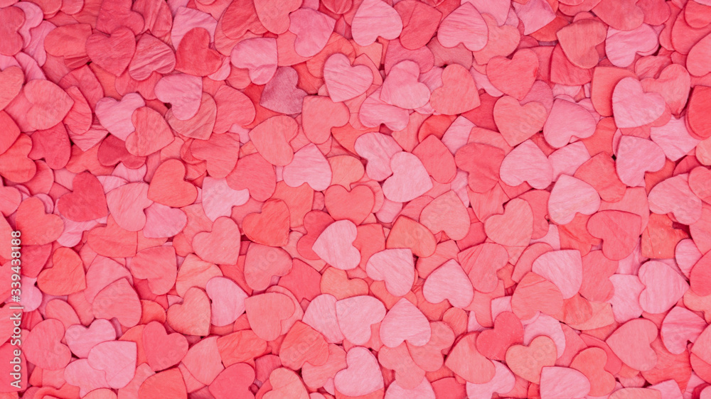 Original romantic background for Valentine's Day. Beautiful background with numerous pink and red hearts for Valentine's Day for wrapping paper, gift bags. Juicy texture of pink and red hearts. Original romantic background for Valentine's Day. Beautiful background with numerous pink and red hearts for Valentine's Day for wrapping paper, gift bags. Juicy texture of pink and red hearts.