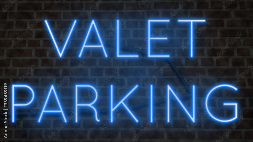Fototapeta premium Colorful neon sign on brick wall for VALET PARKING