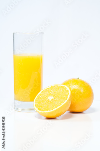 Oranges and juice on white background  healthy drinks  preventing coronavirus
