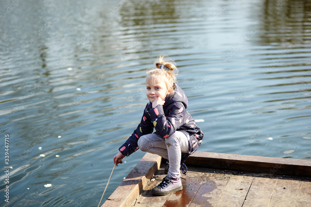Beautiful cute little girl with a grimace on her face, happy childhood and children's emotions
Beautiful cute little girl with a grimace on her face, happy childhood and children's emotions