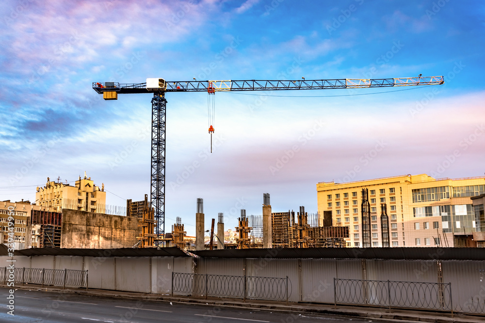 construction site with cranes and building construction site with cranes and building