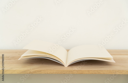 Blank catalog  magazines  book on wood background.