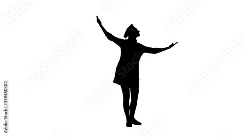 Black silhouette of cook girl raising hands and head up. © kinomaster