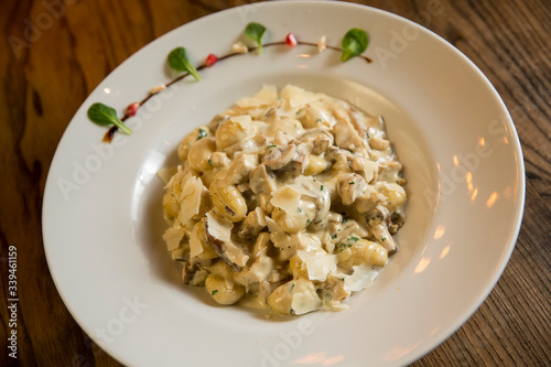 Gnocchi with turkey meat and porcini mushrooms in a cream sauce
