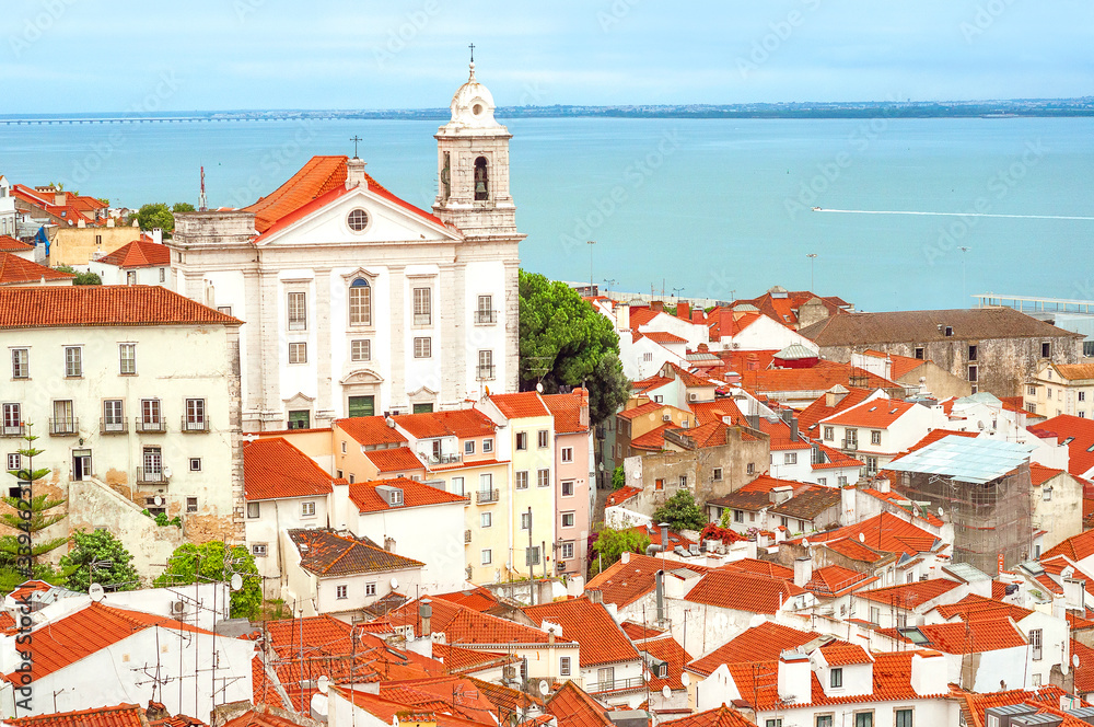 View of Saint Stephen Church  in Lisbon from Miradouro de Santa Luzia viewpoint, Portugal.