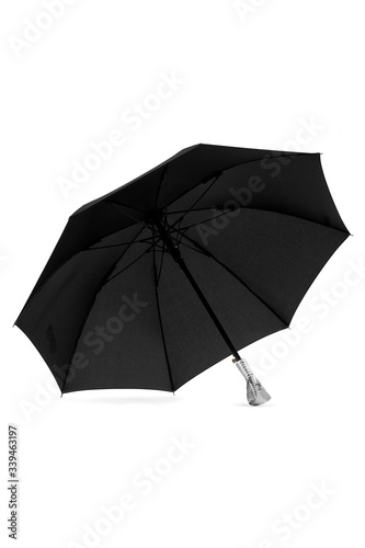 Subject shot of a large black umbrella with an unique silver handle made as a snake head. The stylish umbrella is isolated on the white backdrop. 