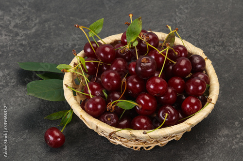 Sweet ripe cherry with leaves