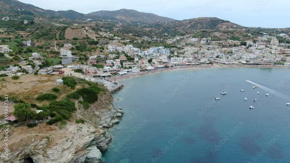 Paradise beach in Crete Island, touristic Mediterranean destination. Aerial forward Paradise beach in Crete Island, touristic Mediterranean destination. Aerial forward