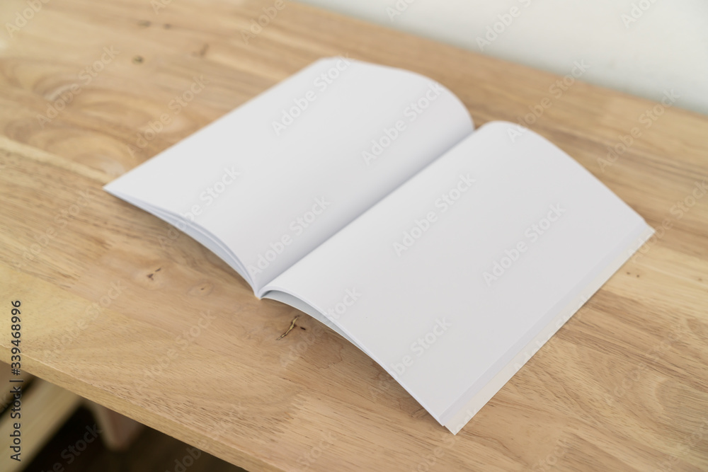 Fototapeta premium Blank catalog, magazines, book on wood background.