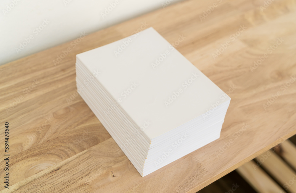 Blank catalog, magazines, book on wood background. Blank catalog, magazines, book on wood background.