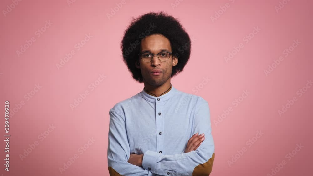 Portrait of serious young African man in studio shot. Shot with RED helium camera in 8K Portrait of serious young African man in studio shot. Shot with RED helium camera in 8K
