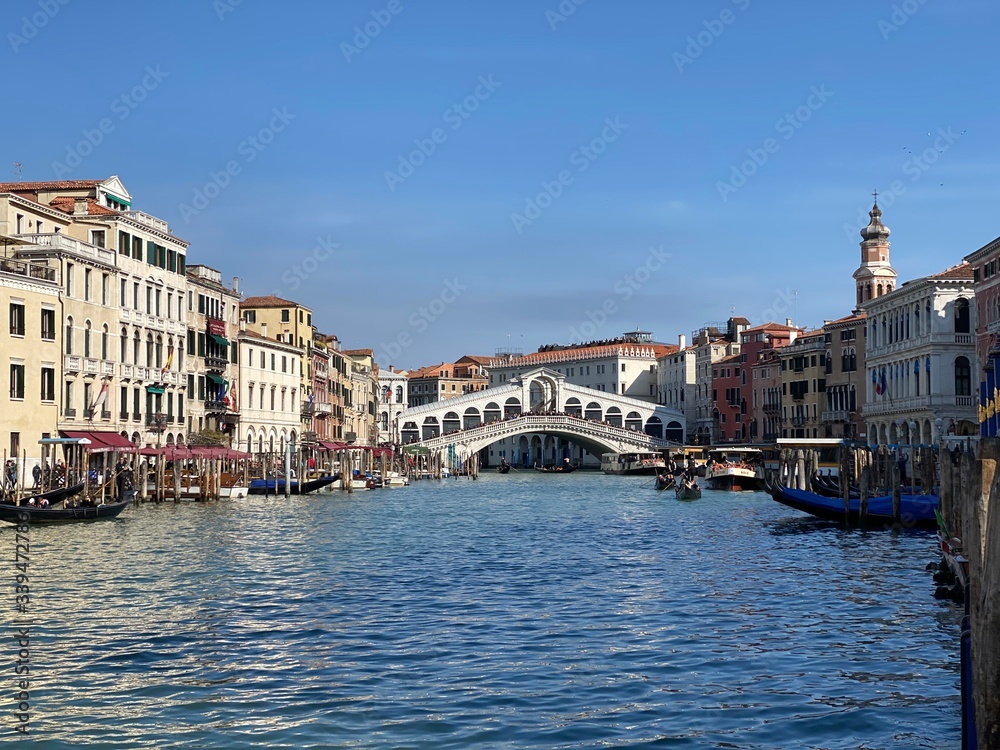 Island murano in Venice Italy. View on canal with boat and motorboat water
