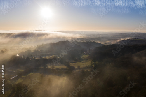 Herefordshire countryside aerial view during British springtime with fog and cloud