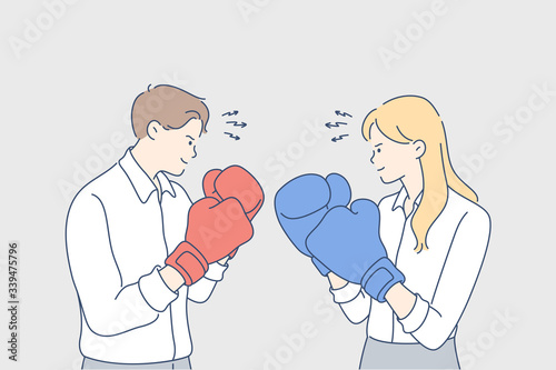 Business competition, boxing, challenge, fighting, rivalry concept. Young businesspeople businessman woman competitors office clerks managers fighting with boxing gloves. Business challenge or rivalry