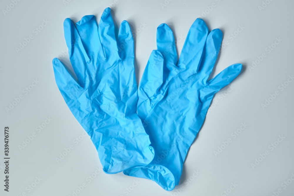 New medical gloves on a white table. New medical gloves on a white table.