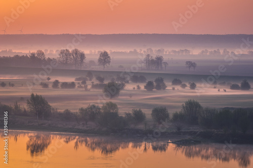 Fototapeta Naklejka Na Ścianę i Meble -  Landscape with foggy morning on the fields in Vistula River Valley in Gniew, Pomorskie, Poland