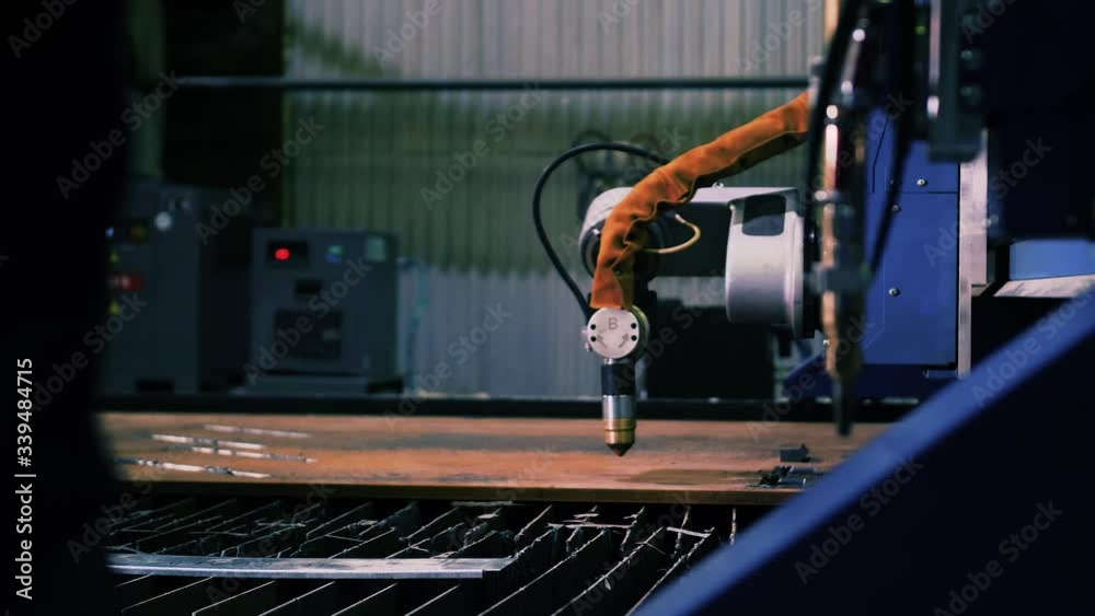 Industrial cnc plasma cutting of metal plate. Industrial cnc plasma cutting of metal plate.