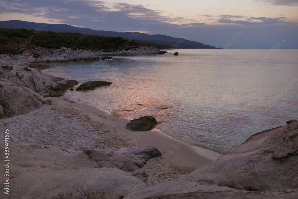 Fototapeta premium night view of one of the sandy and rocky beach in Karidi