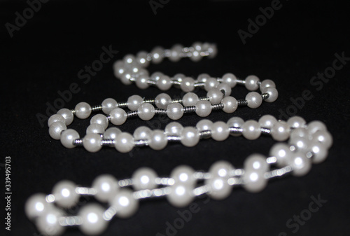 row of Pearl strings abstract background