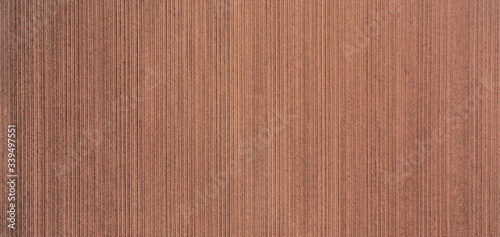 Vertical aerial view from a height of 100 metres of a freshly ploughed field, texture, pattern or background