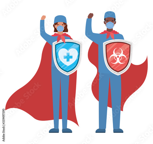 woman and man doctors heroes with capes and shields against 2019 ncov virus