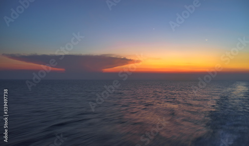Unique unknown cloud object on vivid sunset seen from ferry boat travel trip from Java to Maluku, Indonesia © Edgaras