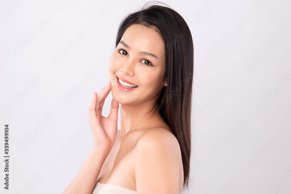 Beautiful Young Asian Woman with Clean Fresh Skin. Face care, Facial treatment, Cosmetology, beauty and healthy skin and cosmetic concept, woman beauty skin isolated on white background Beautiful Young Asian Woman with Clean Fresh Skin. Face care, Facial treatment, Cosmetology, beauty and healthy skin and cosmetic concept, woman beauty skin isolated on white background