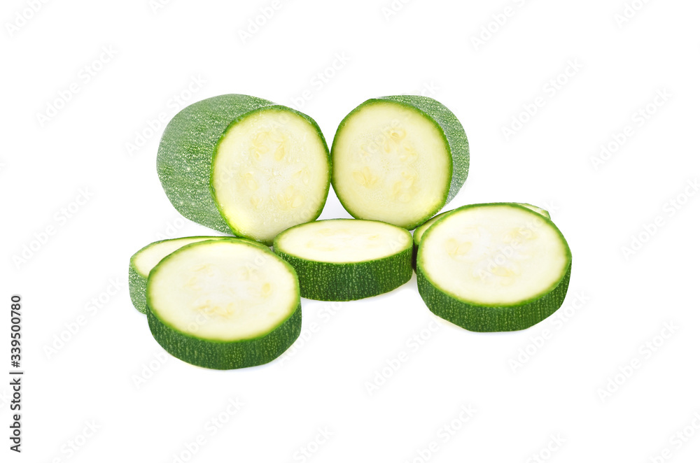 fresh green zucchini with slice isolated on white background fresh green zucchini with slice isolated on white background