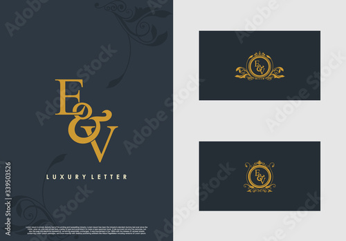 EV logo initial vector mark. Gold color elegant classical symmetric curves decor.