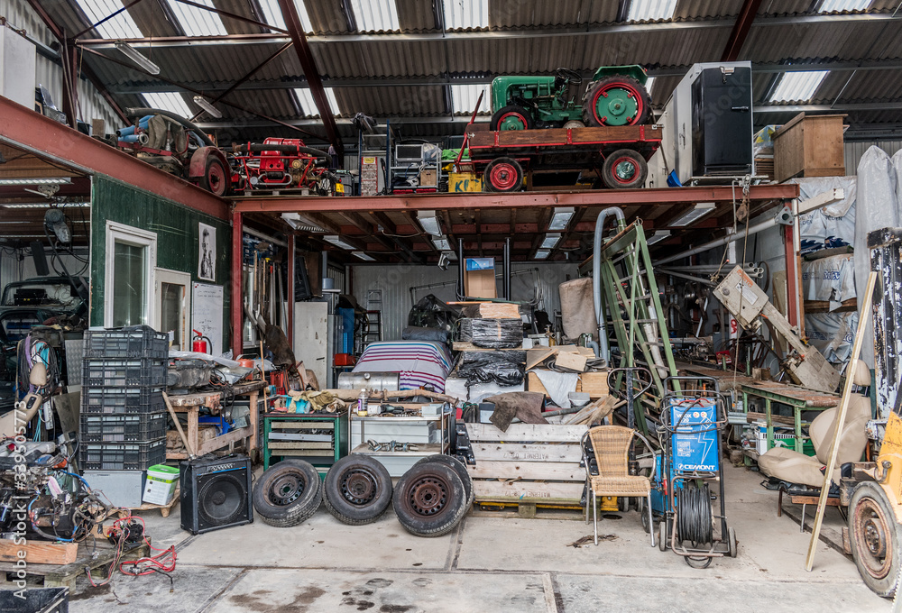 Garage workshop full of machinery and equipment